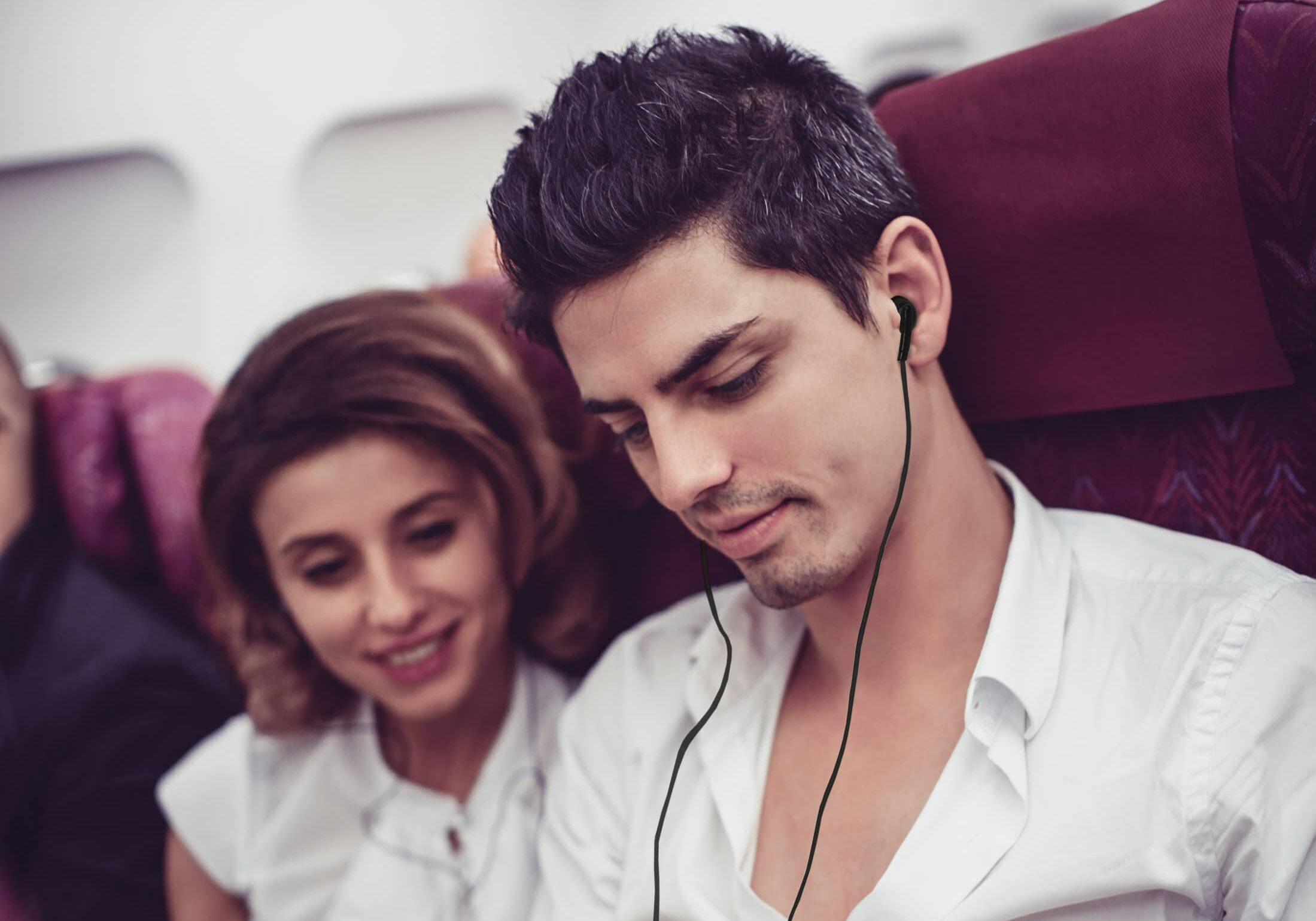 Cute Couple Make Playlist for the Long Overseas Flight